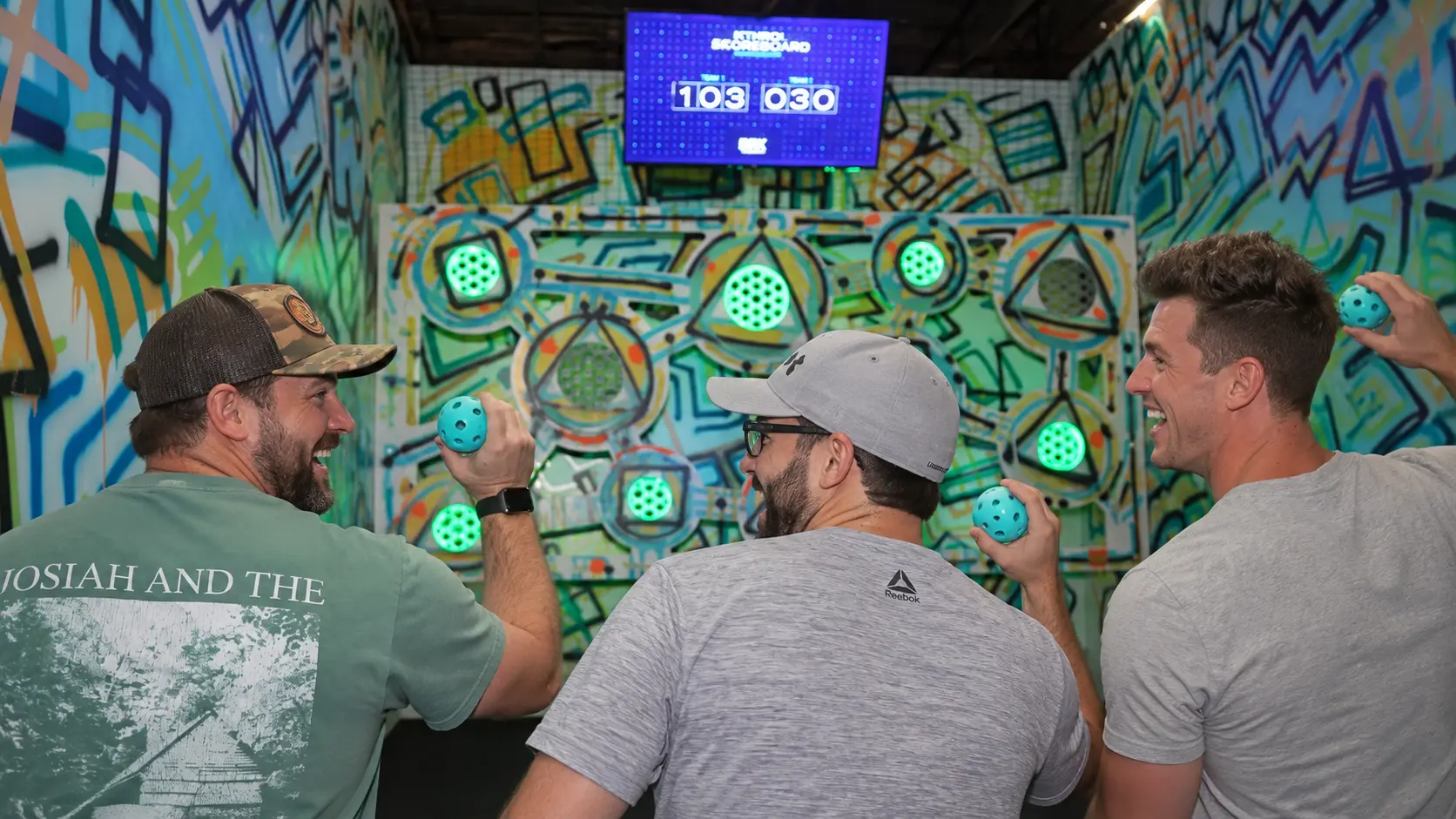 A group playing an immersive BRKTHROUGH challenge room