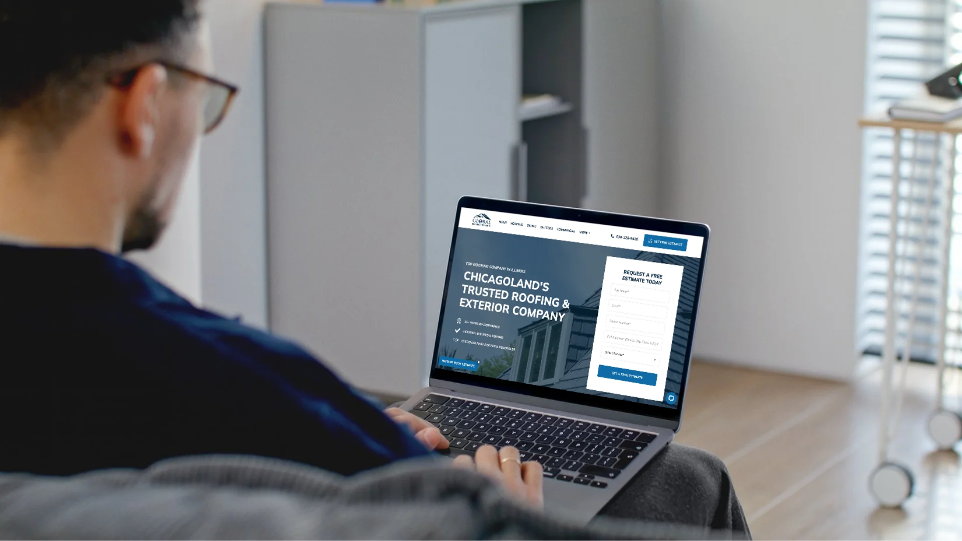 Roofing web design expert at work.