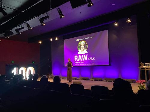 Niamh O’Brien delivering a keynote on stage – inspiring quiet power, leadership, and authentic communication