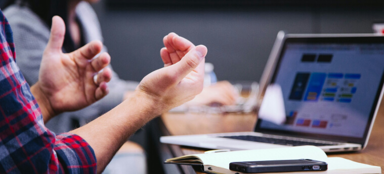 Confident hands gesturing while speaking – transforming from social discomfort to skilled communication