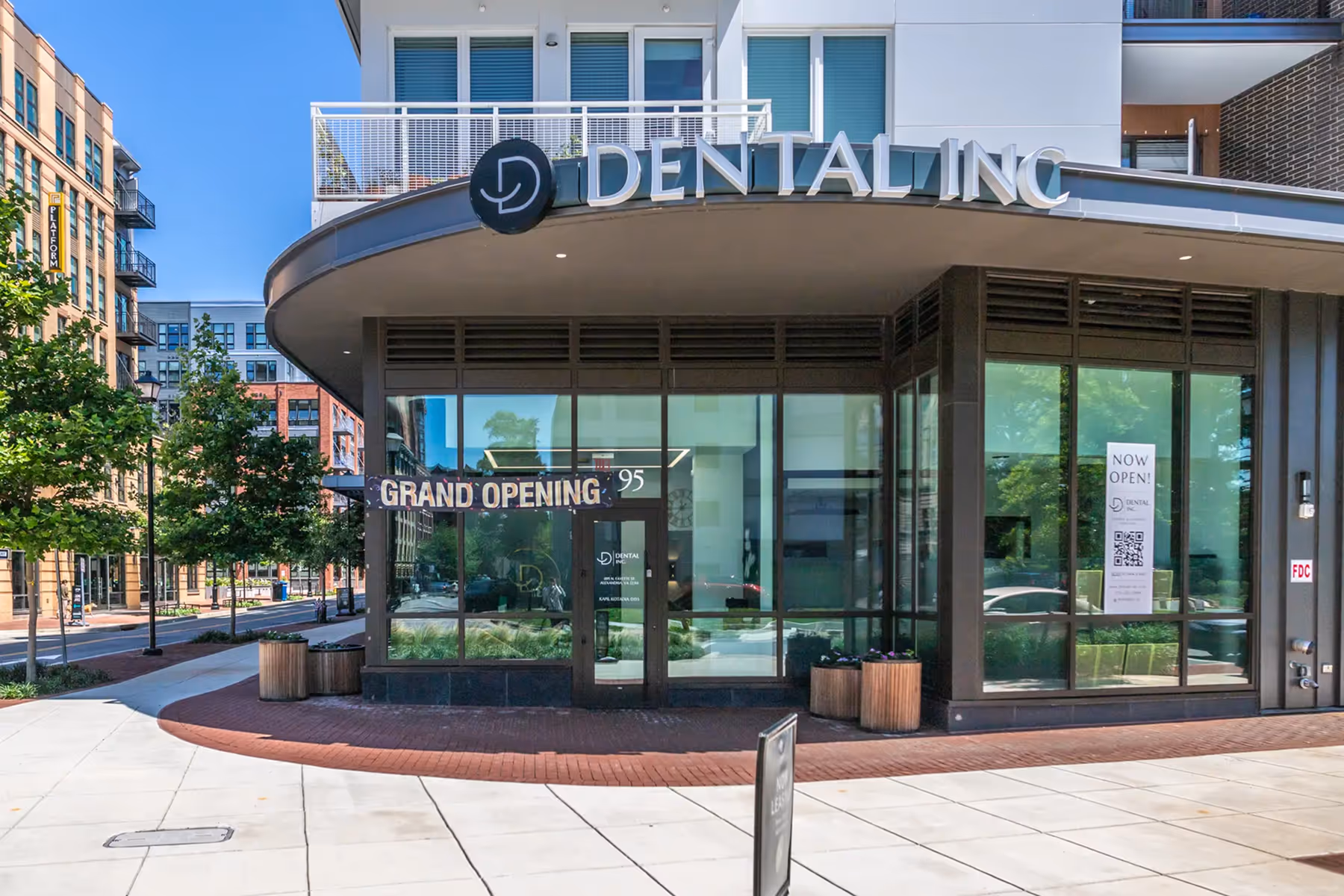 A building with a sign that says dental clinic.