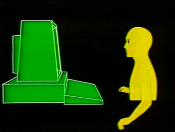 Retro CGI animation of a yellow humanoid figure standing next to a green geometric computer terminal on a black background