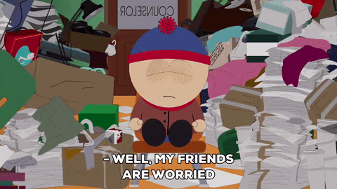 Animated GIF of Stan Marsh from South Park sitting cross-legged in a messy room overflowing with stacked papers and clutter, with the caption "Well, my friends are worried.