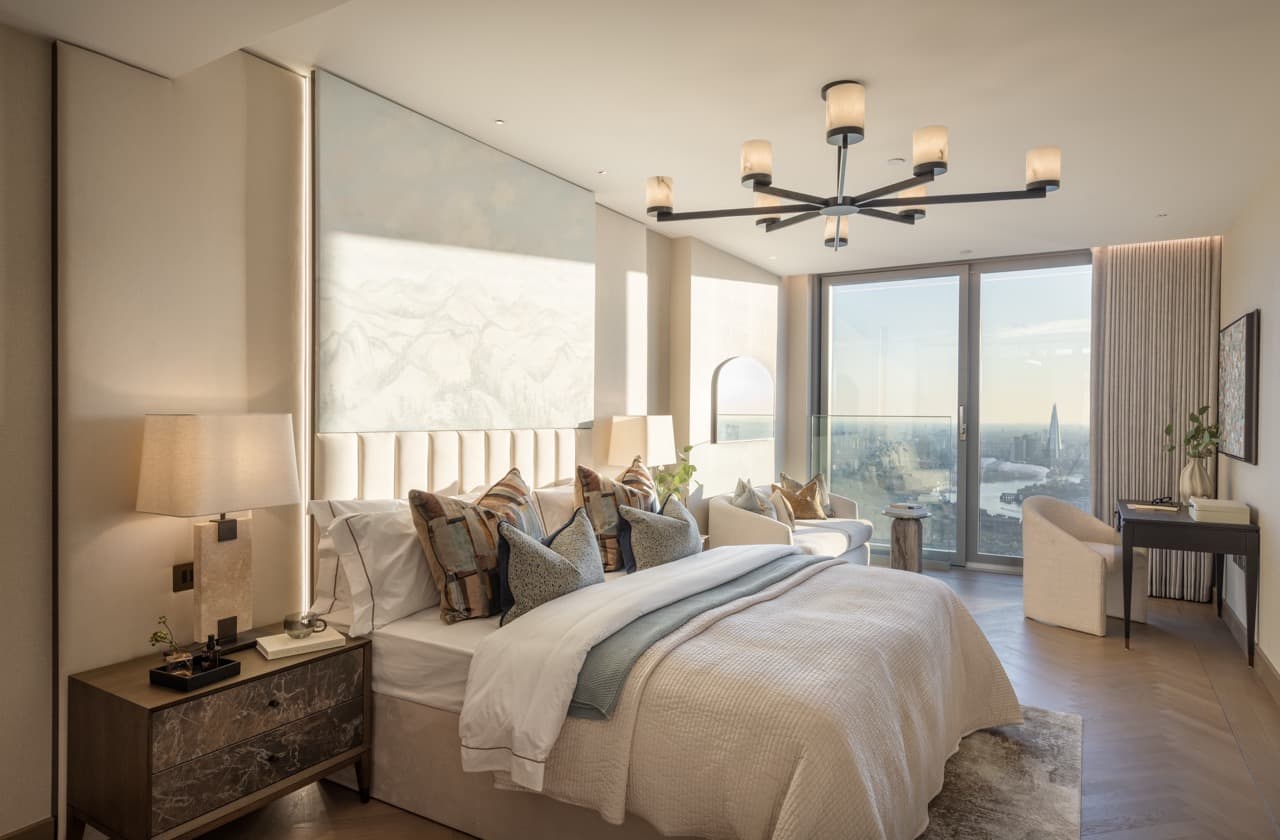 Principal bedroom with floor-to-ceiling windows and London skyline views