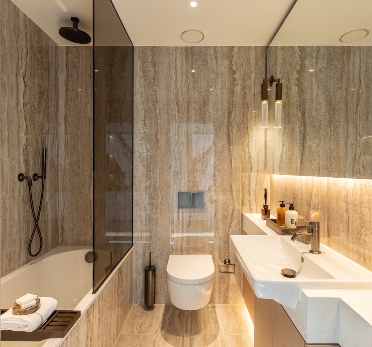 Bedroom two ensuite with bath and overhead shower