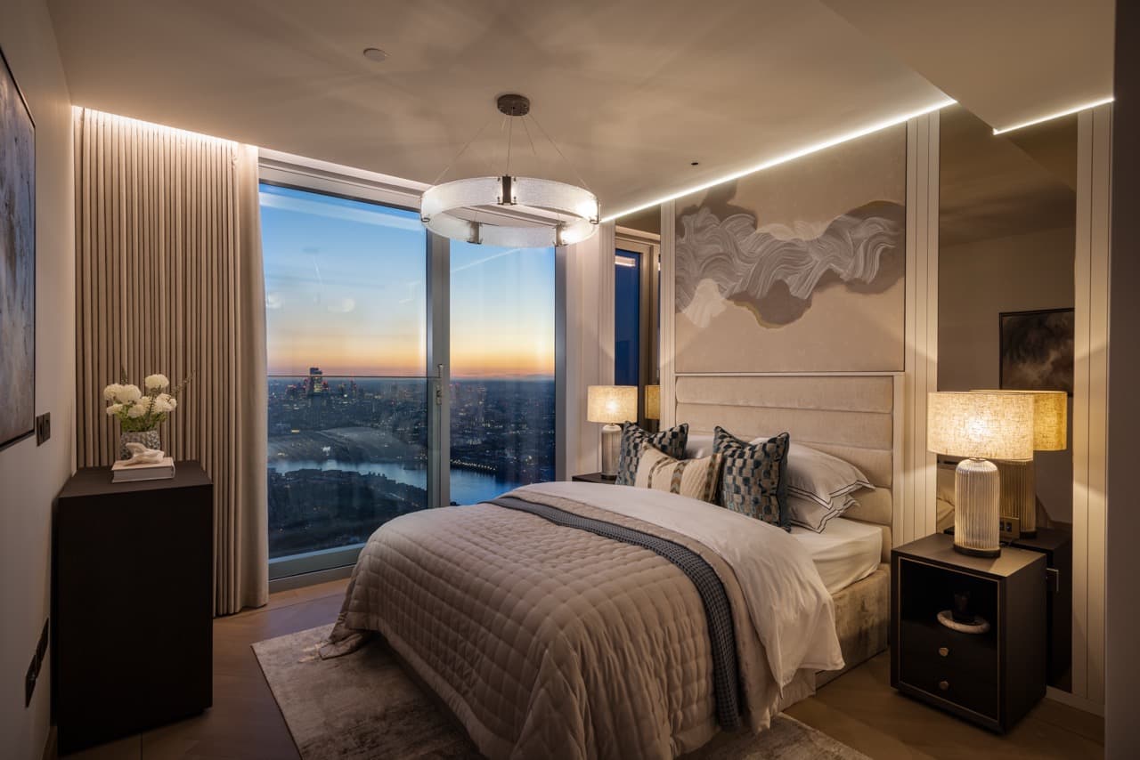 Bedroom three with evening city views