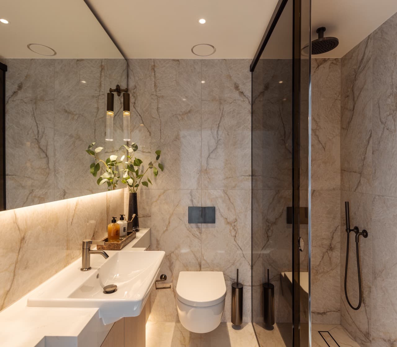 Bedroom three ensuite with a glass shower enclosure