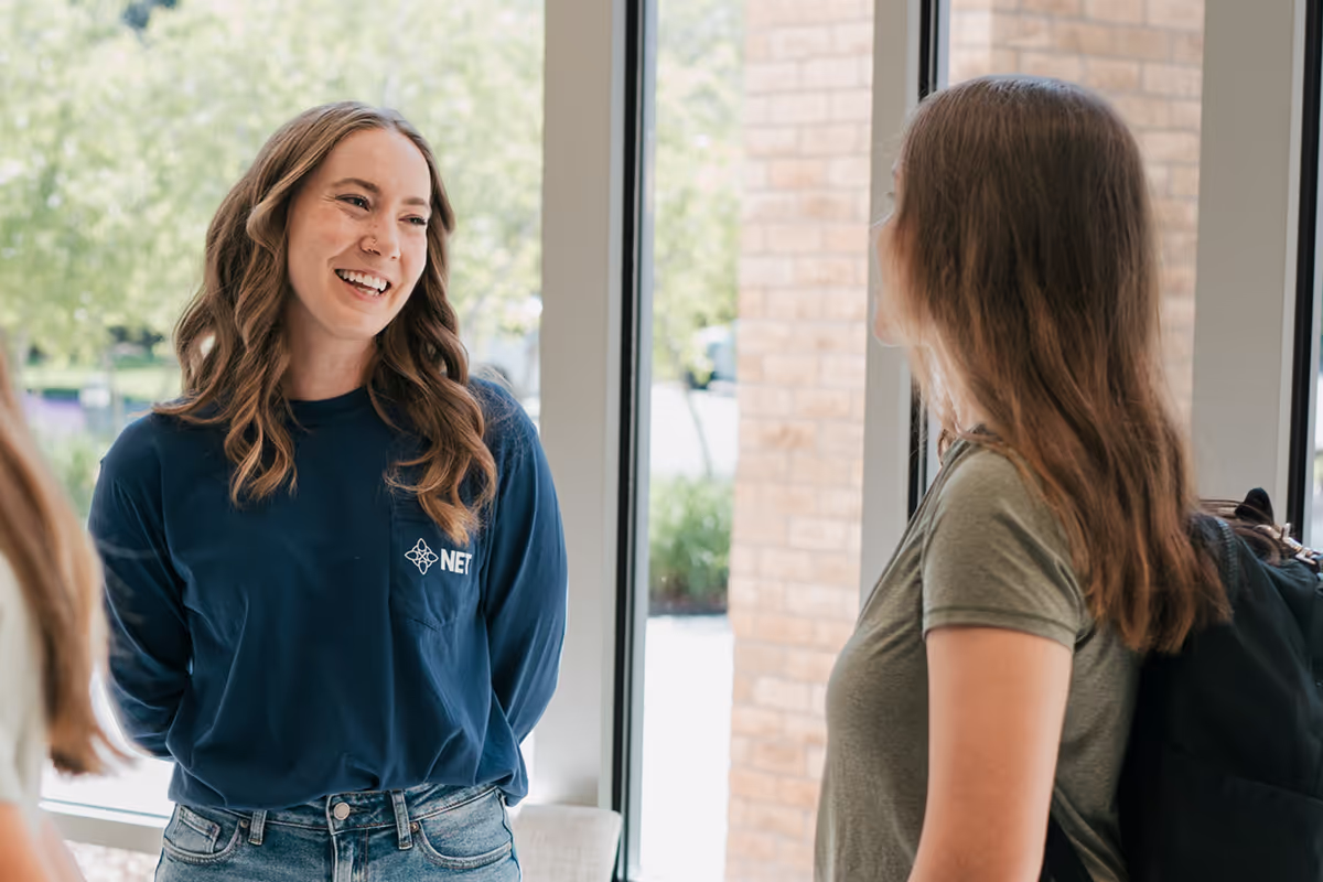 NET Missionary talking to a teen