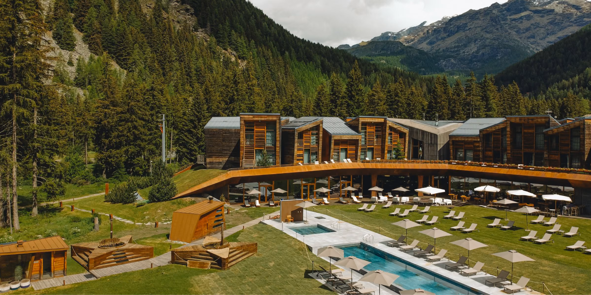 Aethos Monterosa summer garden exterior heated pool