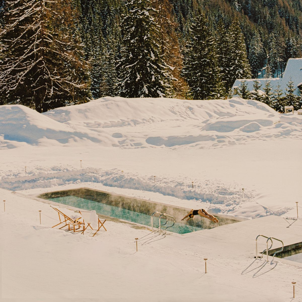 Aethos Monterosa Hotel exterior garden with heated pool in Champoluc