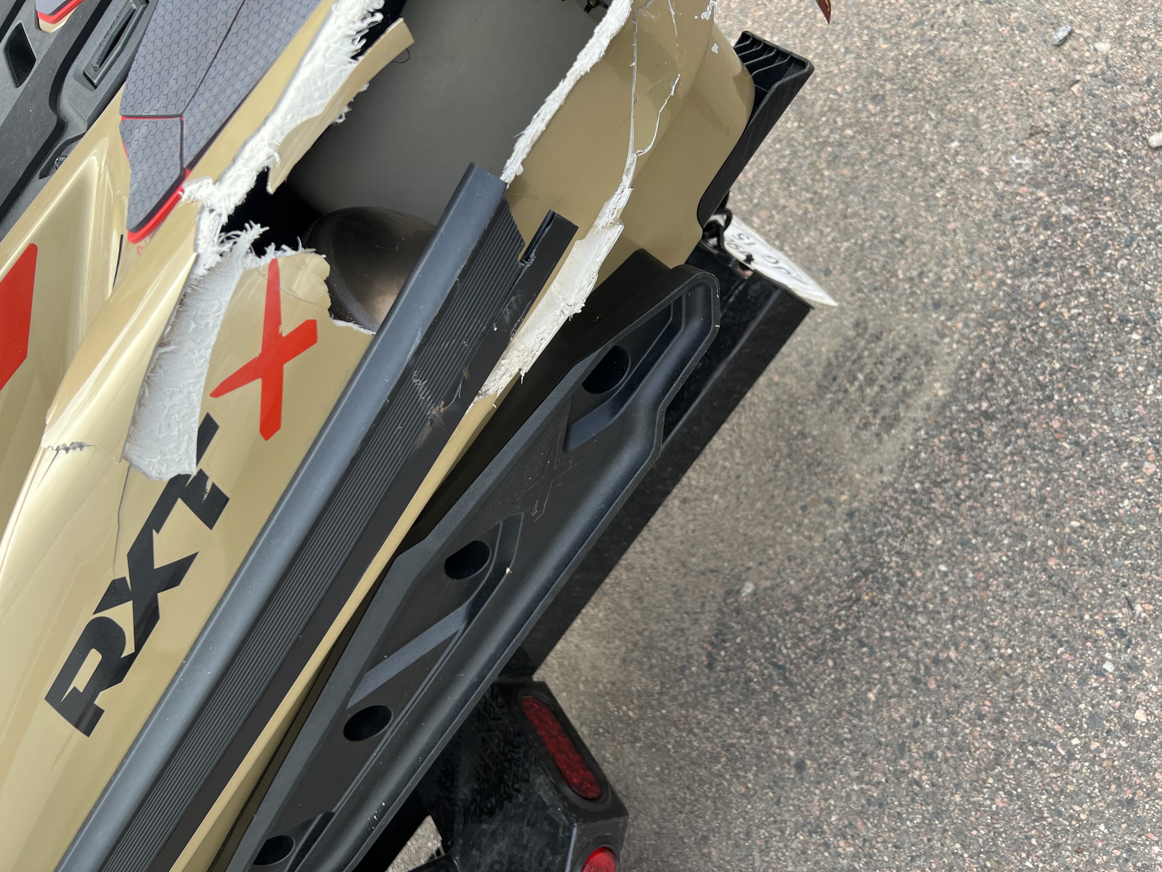 A Jetski with severe fiberglass damage waiting to be repaired at Fiberglass Worx