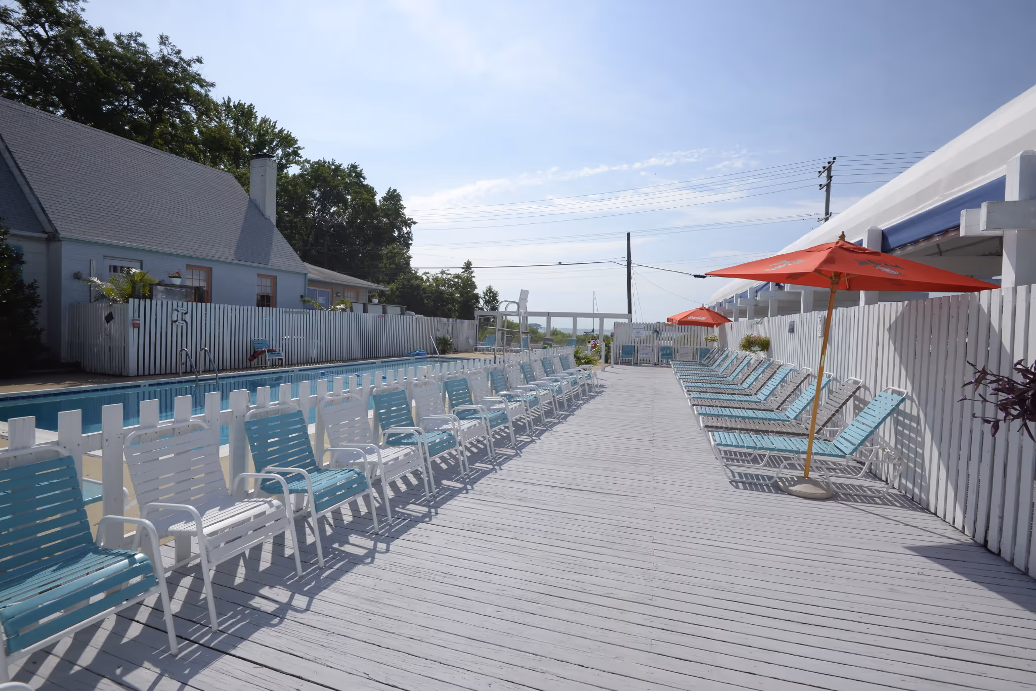 Liberty Marina Boating Community pool image showing boaters relaxing and swimming, capturing the social and recreational atmosphere of the marina.