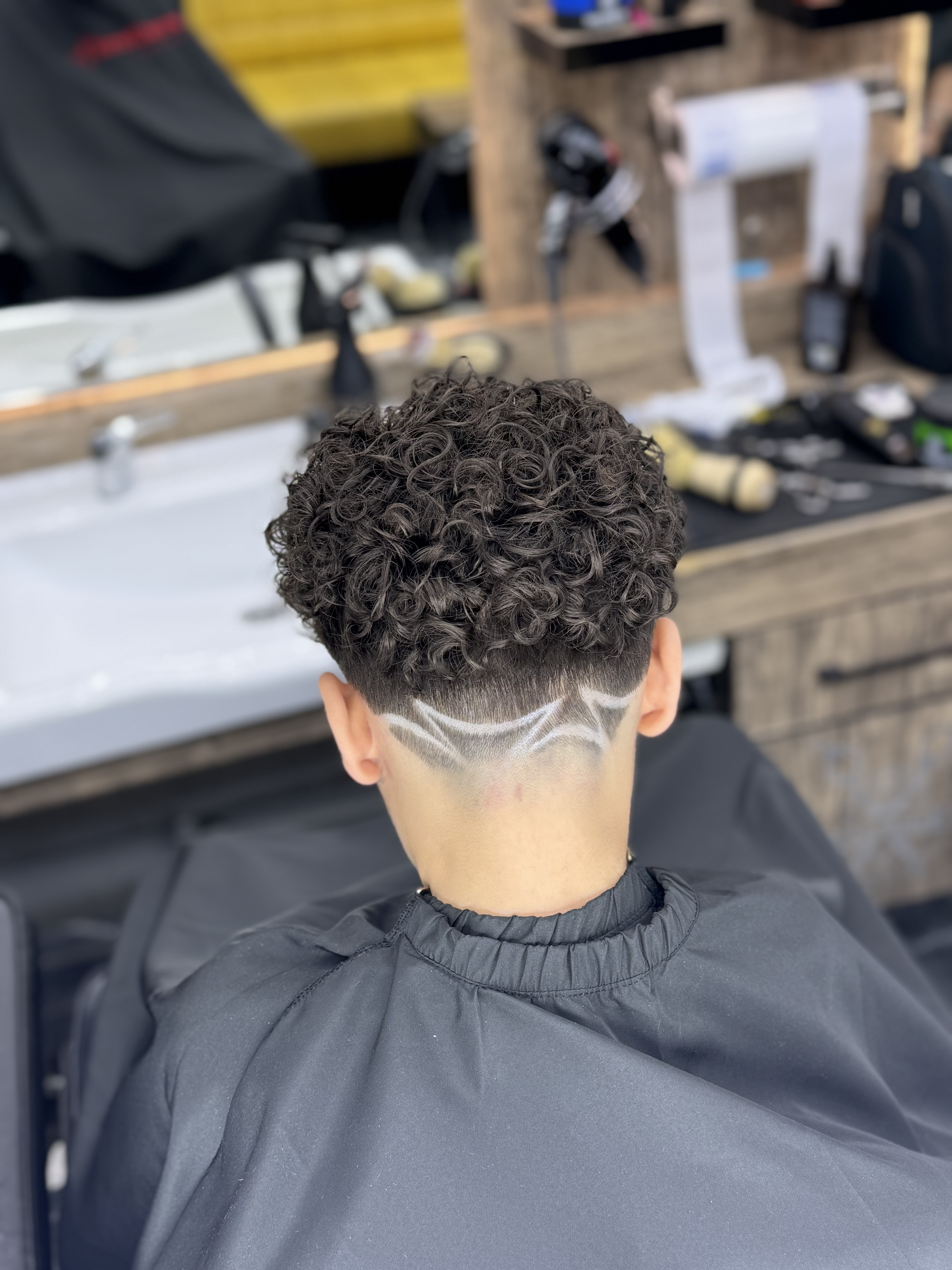 Curly Top Low Fade & Nape Design