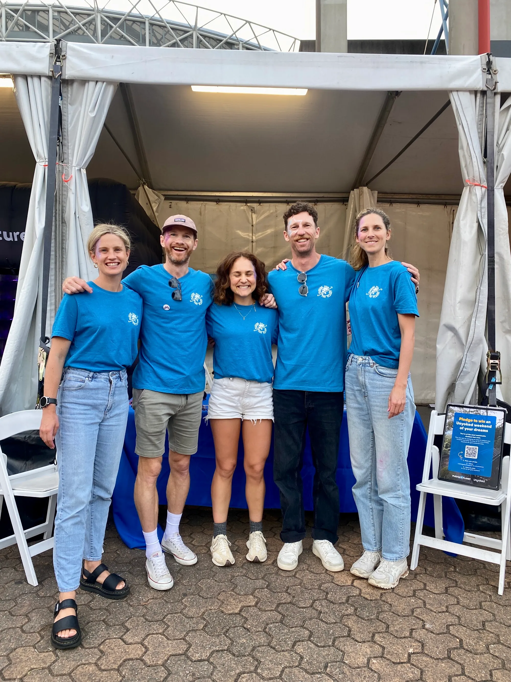 The Pledge team at the Coldplay activation stand