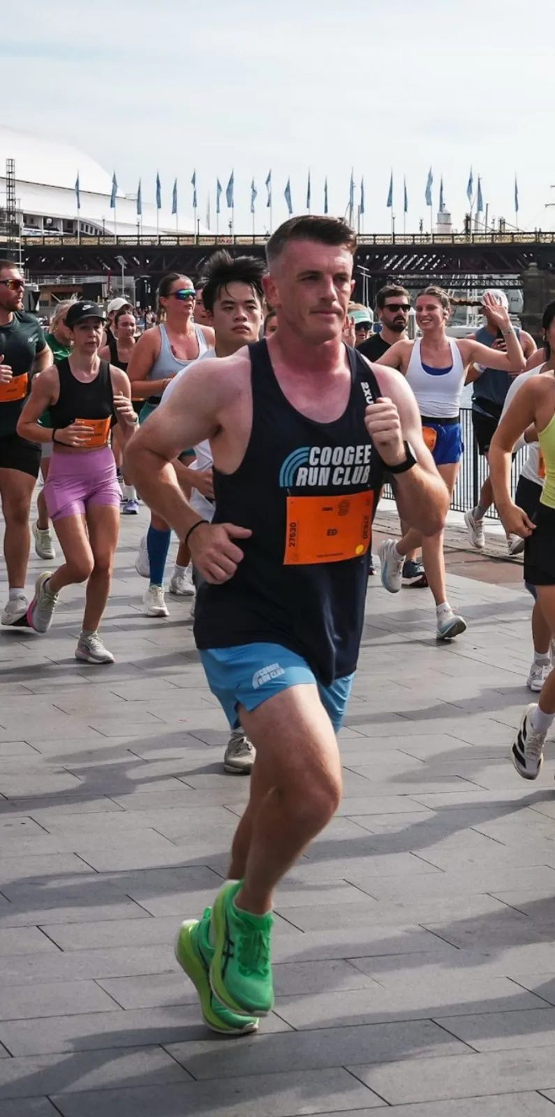 Edward Gallagher racing in a Coogee Run Club singlet