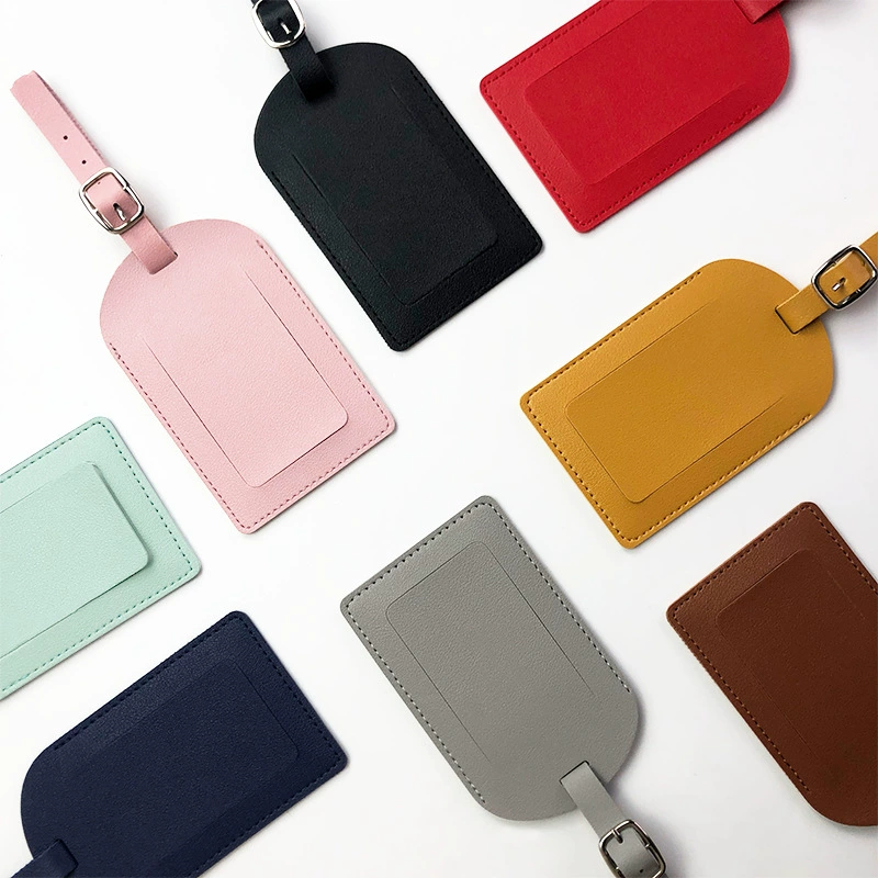 Custom PU leather luggage tag corporate gift, personalised with a company logo — Singapore