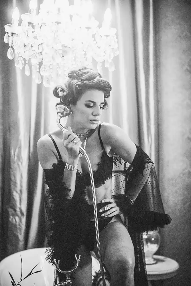 Model posing in a vintage-inspired setting at Balquisse Heritage Hotel Bali, a top photography venue hotel in Jimbaran for glamour shoots.