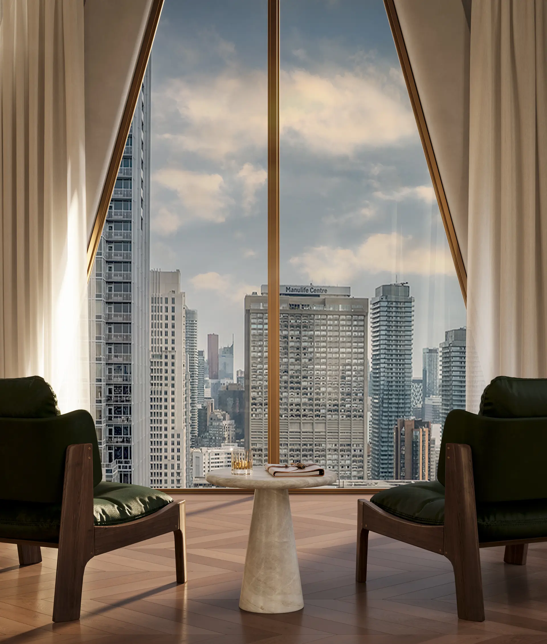 Two dark green leather armchairs framing a travertine side table before a gold-trimmed floor-to-ceiling angled window with downtown skyline views.
