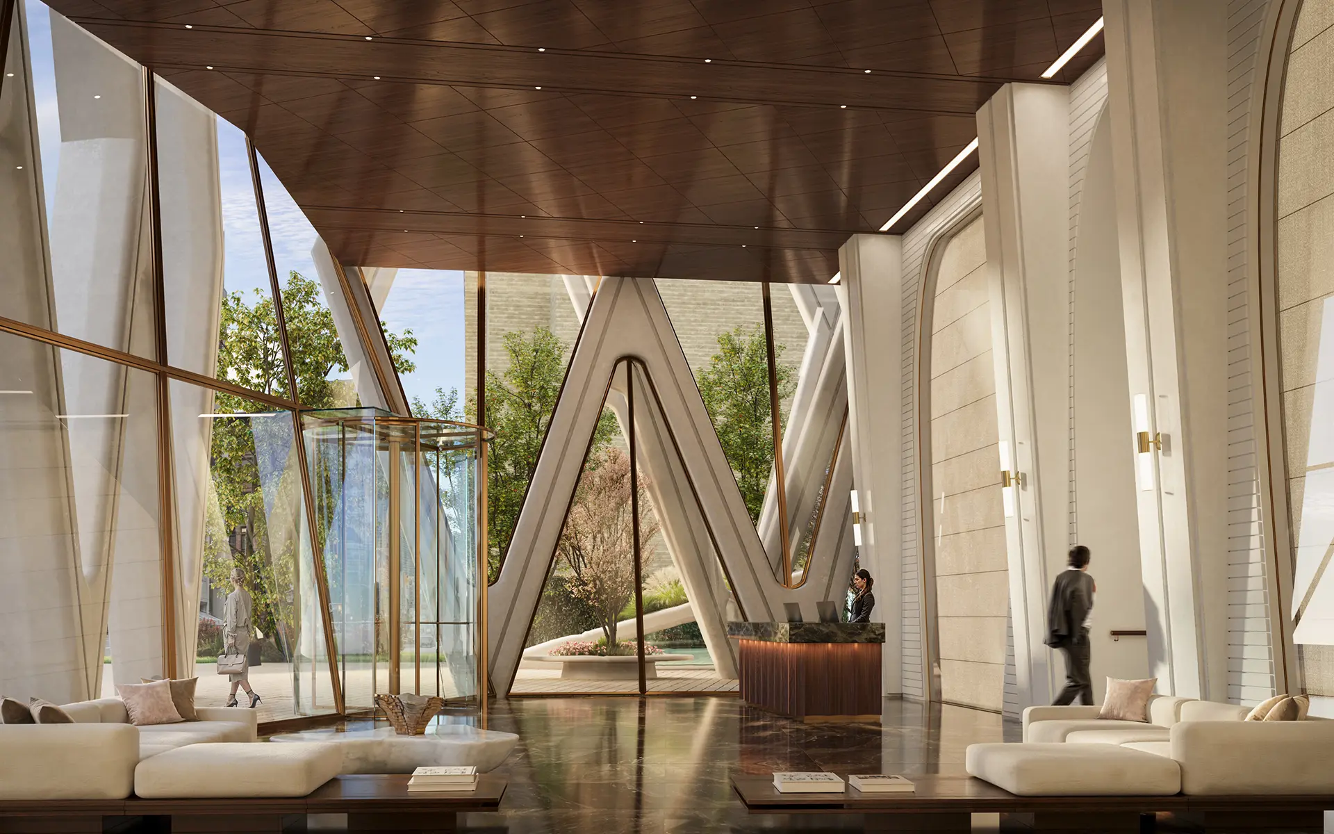 Hotel lobby with sculptural white columns, gold-framed floor-to-ceiling windows, and cream lounge seating.