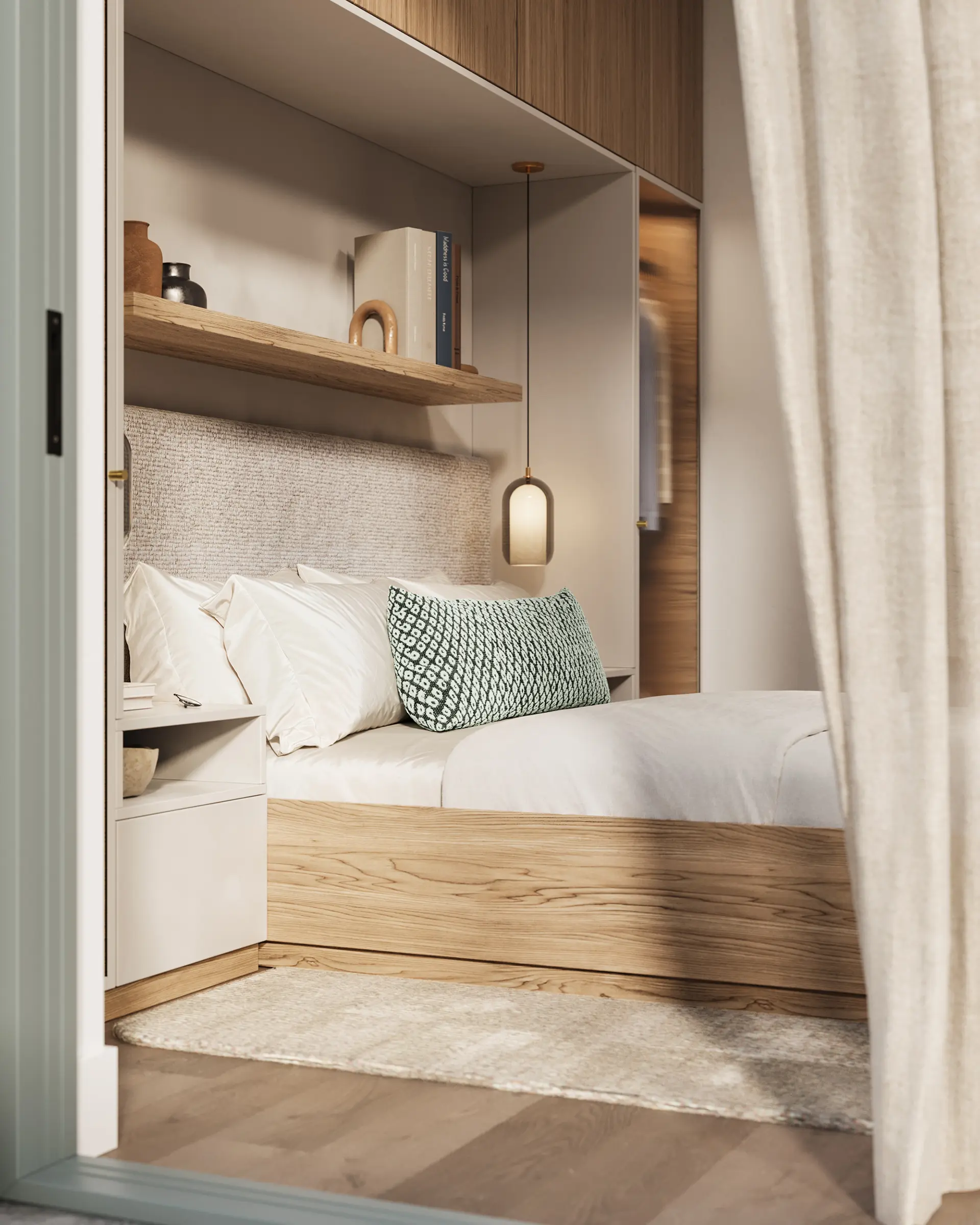 Modern bedroom with a light wood bed frame, beige textured headboard, white bedding, and a green patterned pillow.