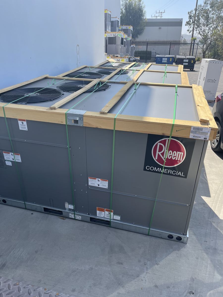 New Rheem Commercial package units staged for installation — commercial HVAC replacement by Rhino Air