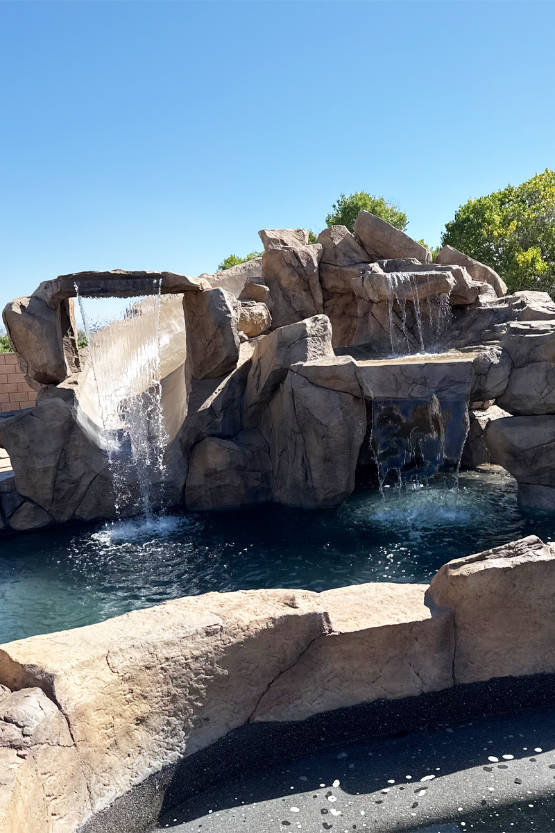 A beautiful swimming pool with cascading waterfalls 