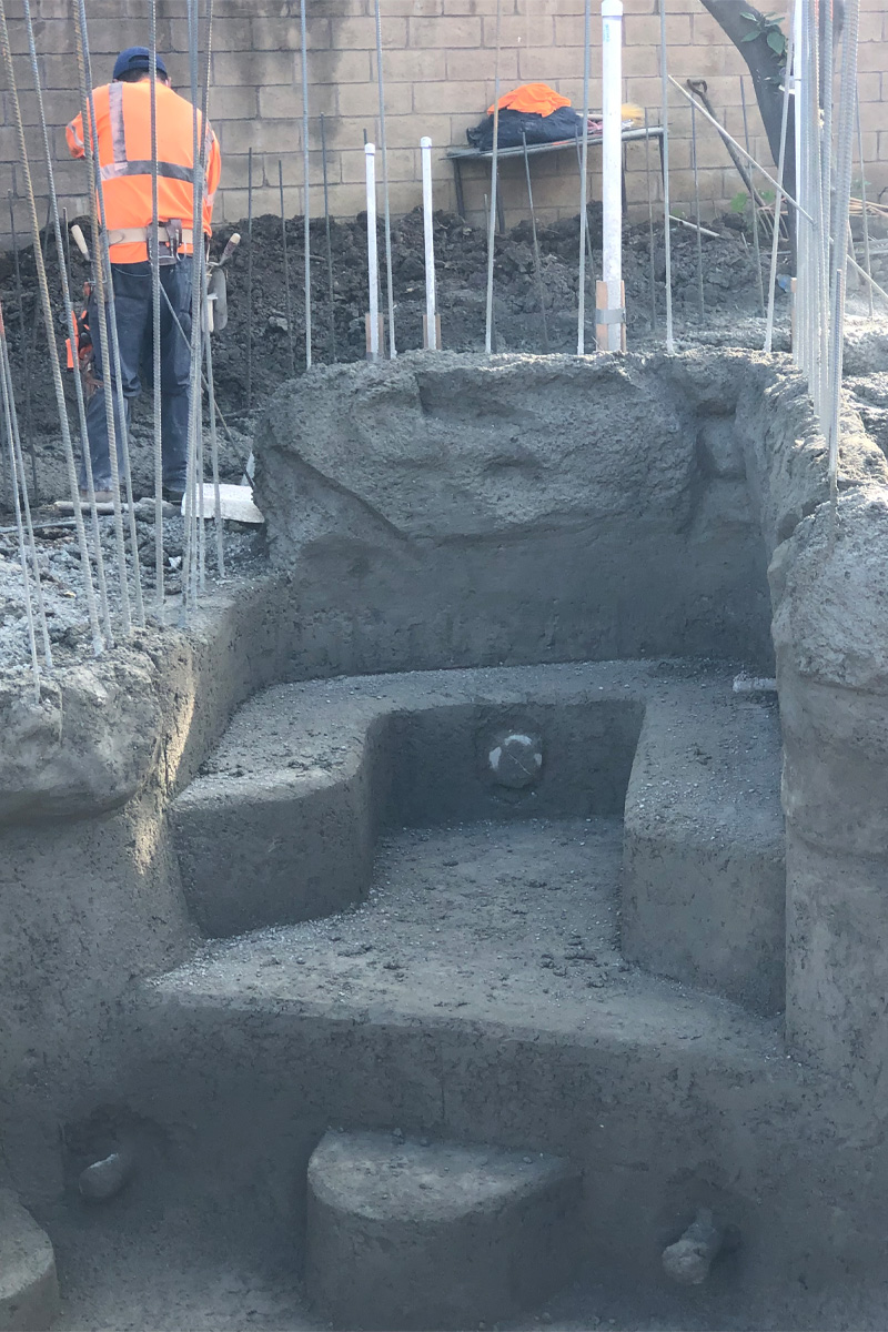 Men working on an iron structure.