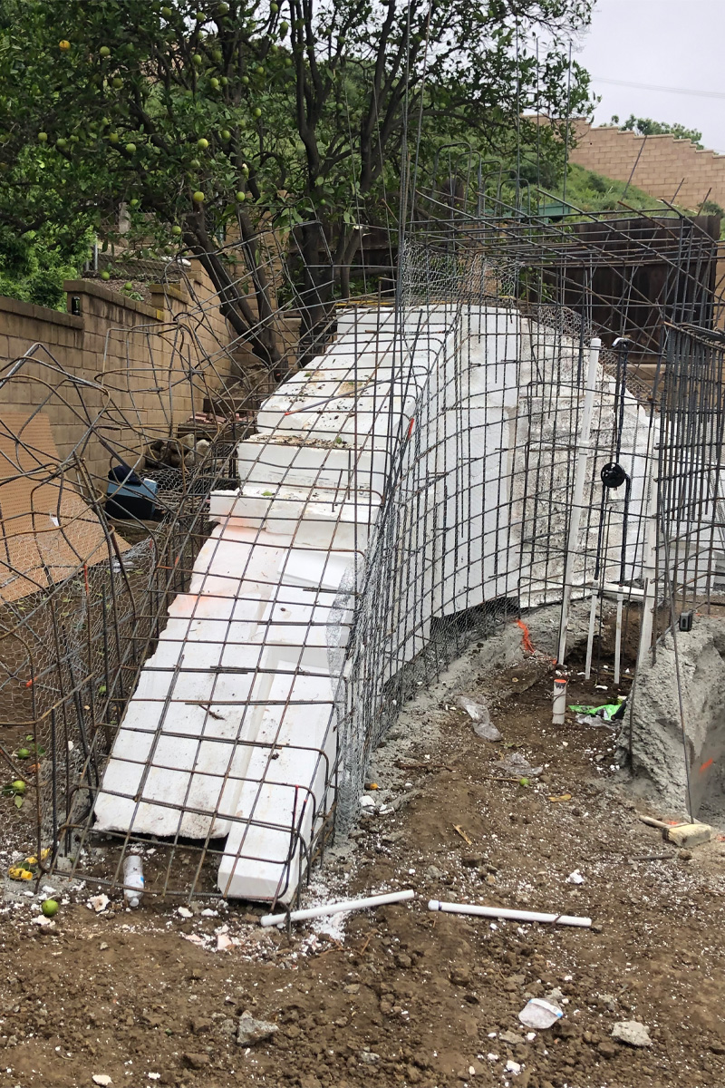 Iron bars arranged to form a structural framework.

