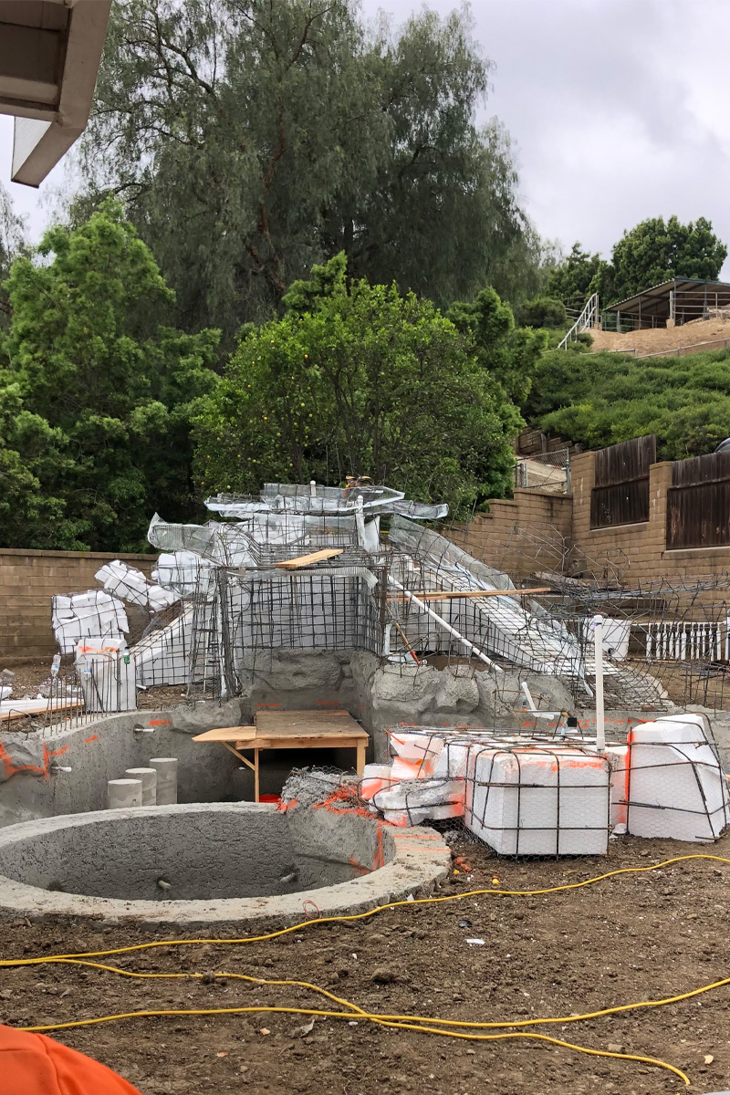 Iron bar structure under construction.