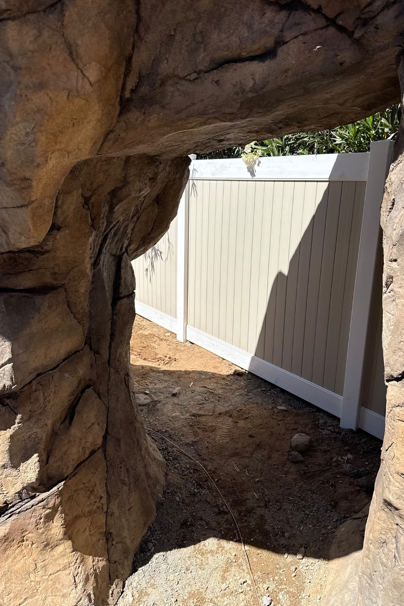 A cave-like structure or grotto made from stones.