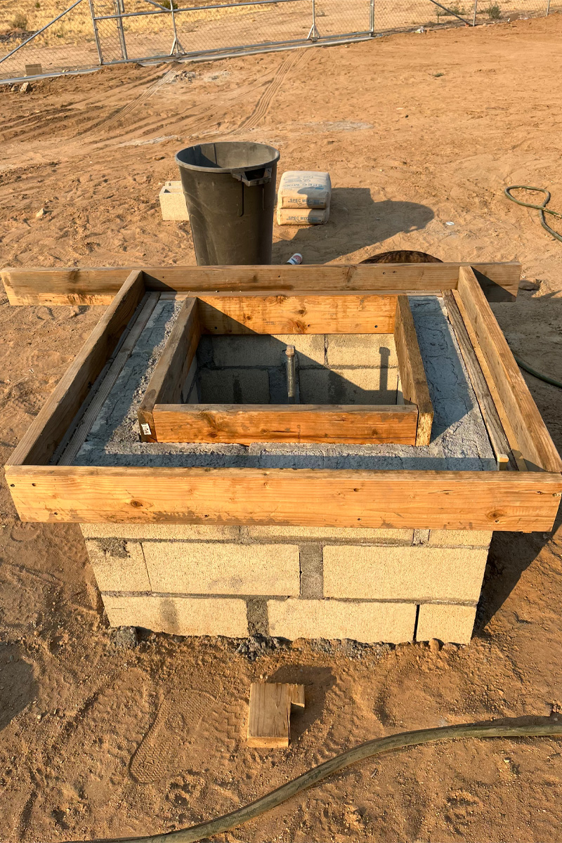 A fireplace currently in the process of being built.