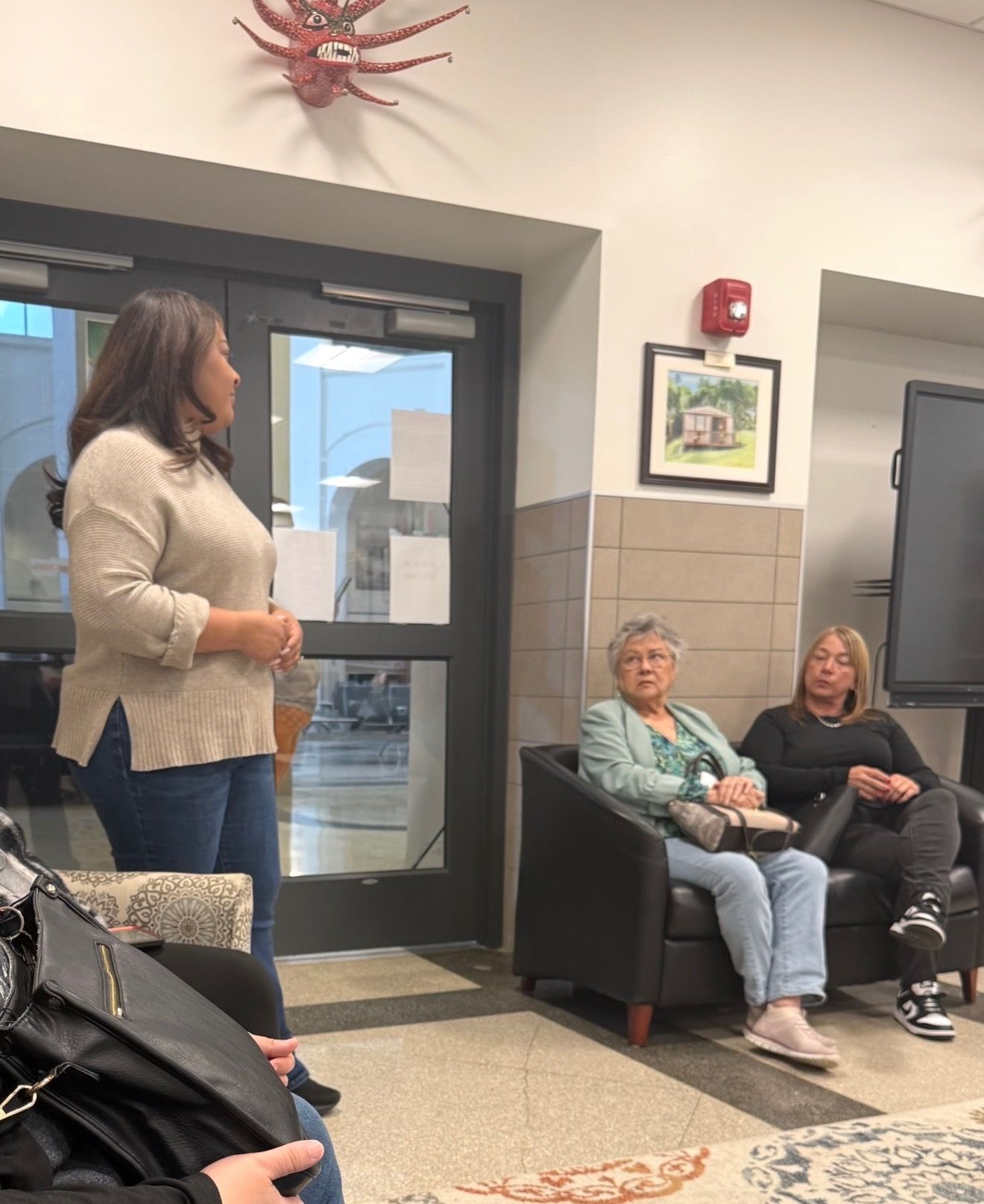 Parents and caregivers gathered in community discussion and support.