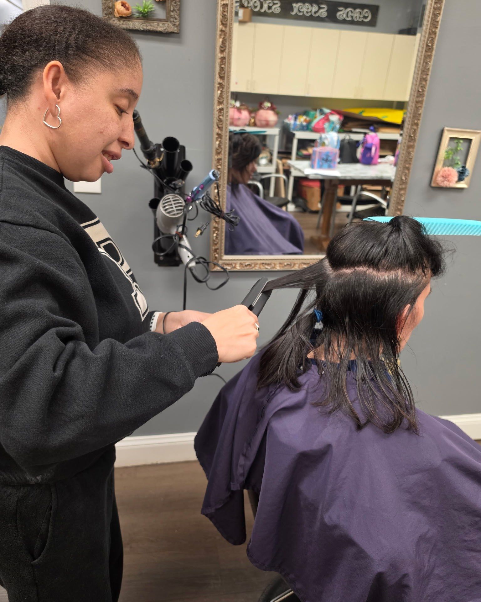 Participant receiving hands-on hair salon vocational training at Sunshine Village.