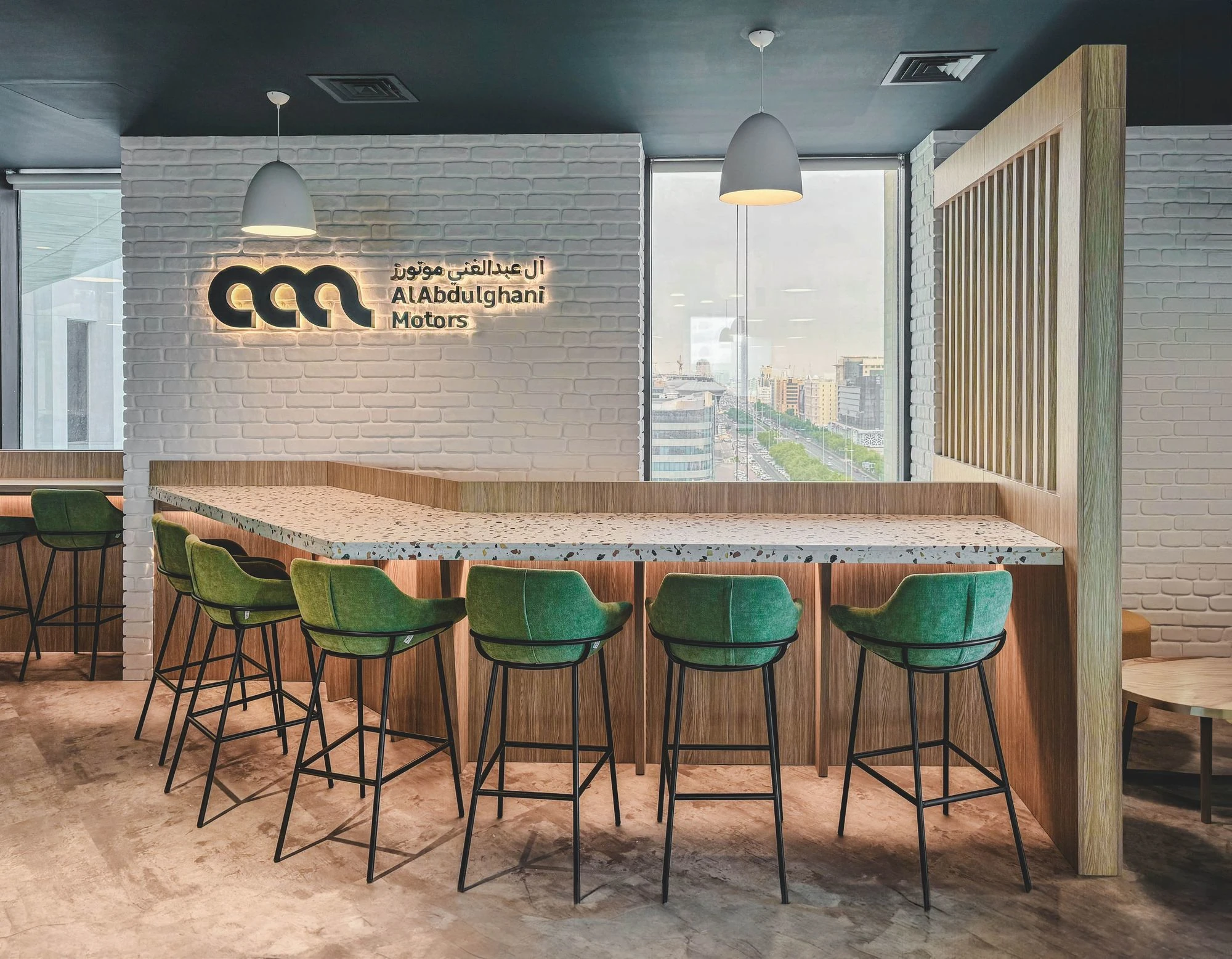 AAB Toyota break room bar counter with branded logo wall, Doha, Qatar, by Daya