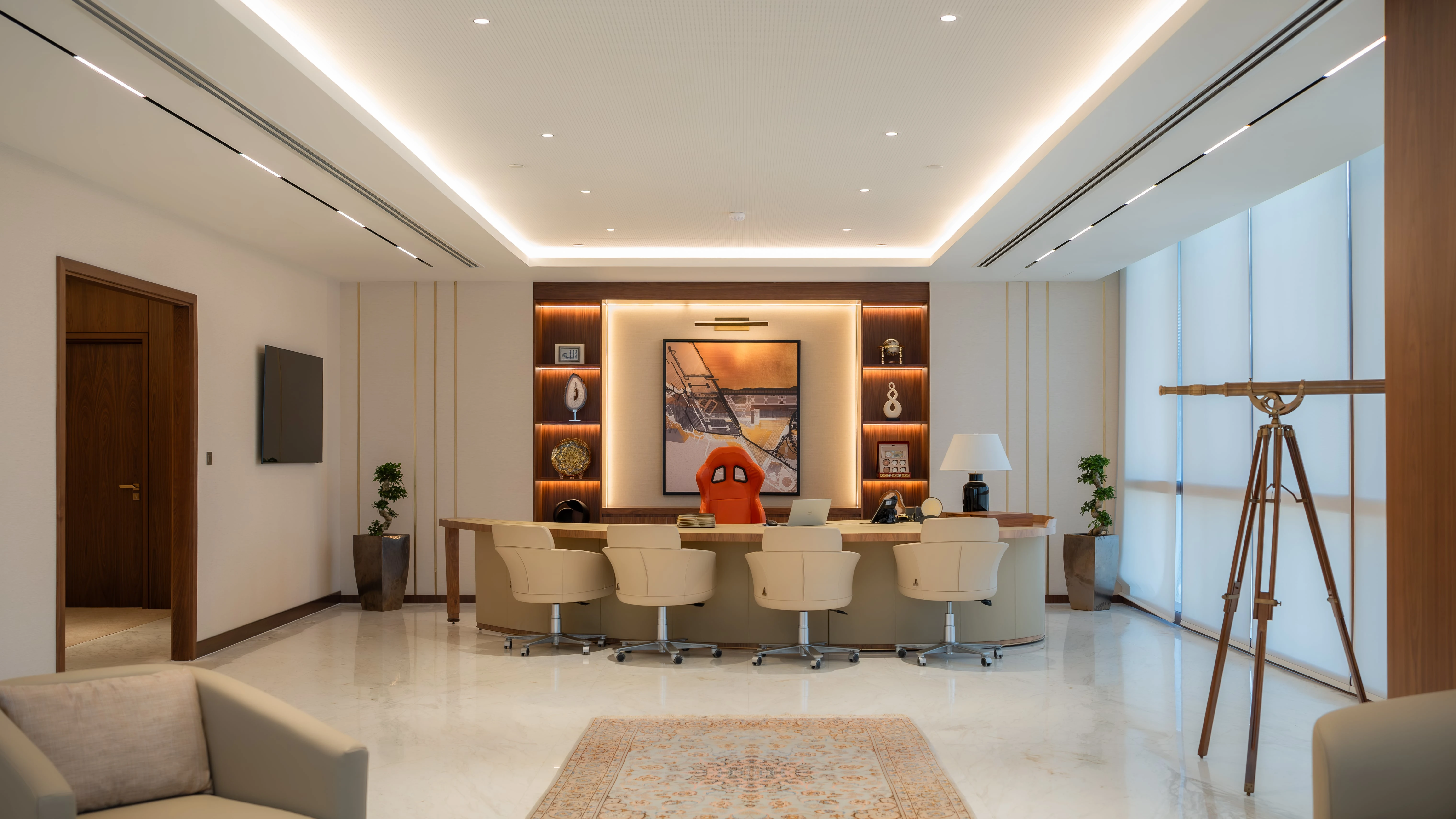 Katara Hospitality office with long meeting table and wall art display, Burj Marina Building, by Daya
