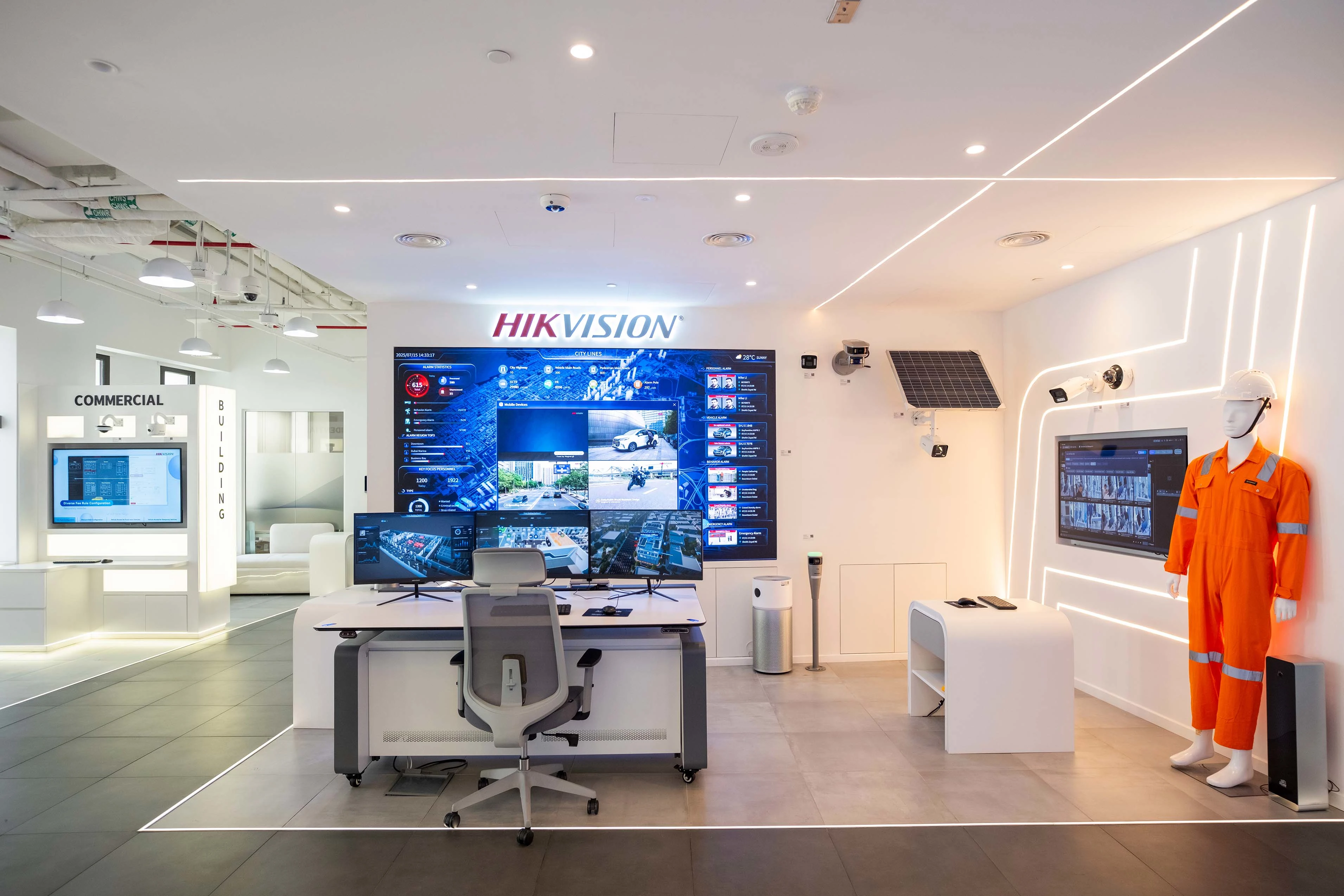 HIK Vision showroom with security camera displays and safety workwear mannequin, Msheireb, Doha, by Daya