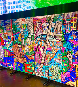 Colorful street art mural with abstract and cartoonish elements, including animals, buildings, and geometric shapes.