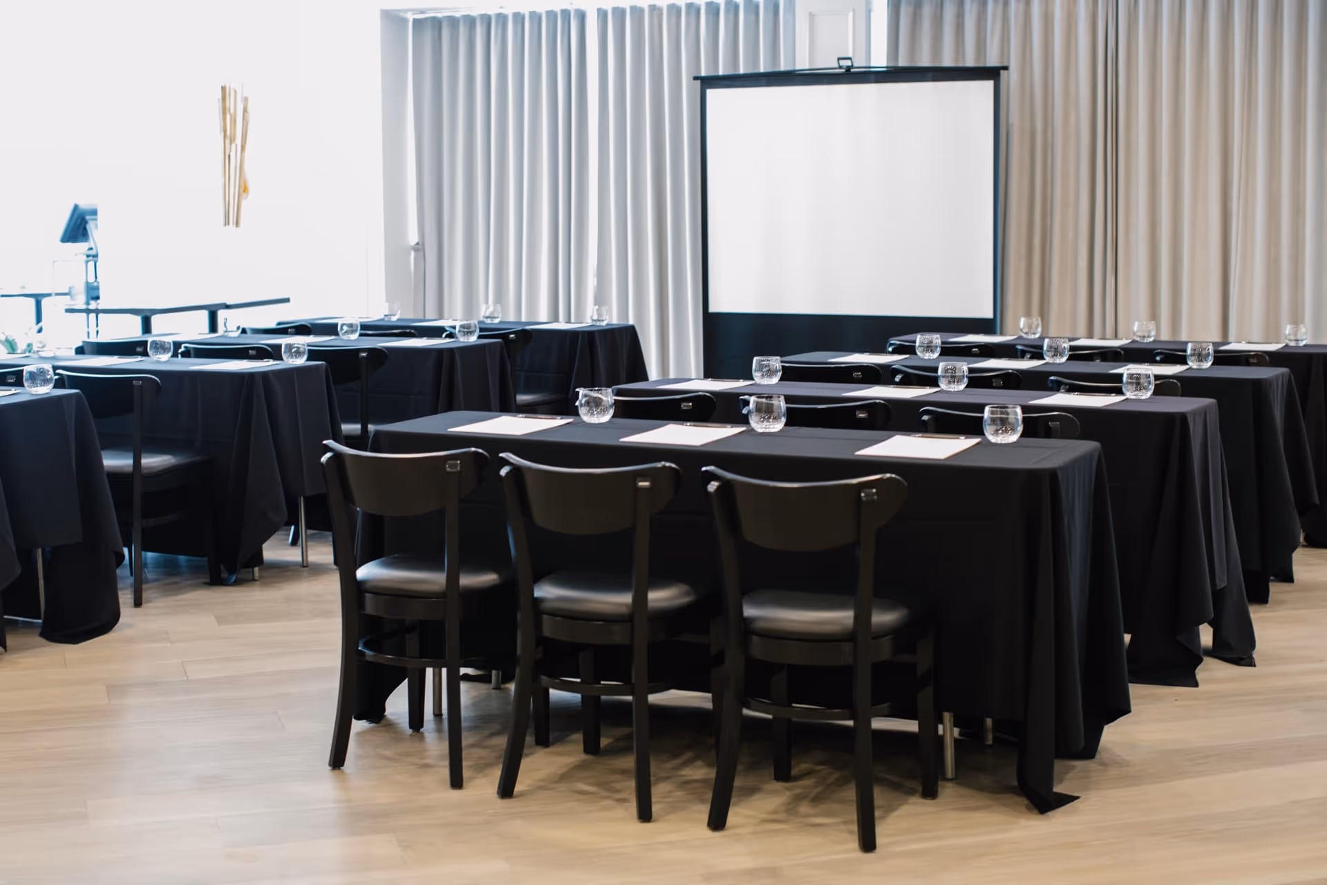 A conference room with chairs set up