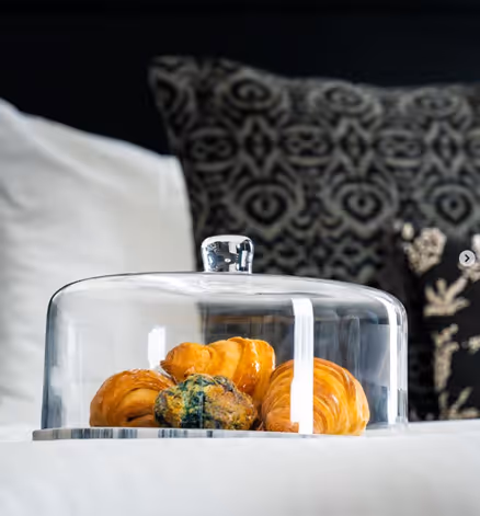 A selection of freshly baked pastries greets guests upon arrival at their room during a stay at The Dorchester 