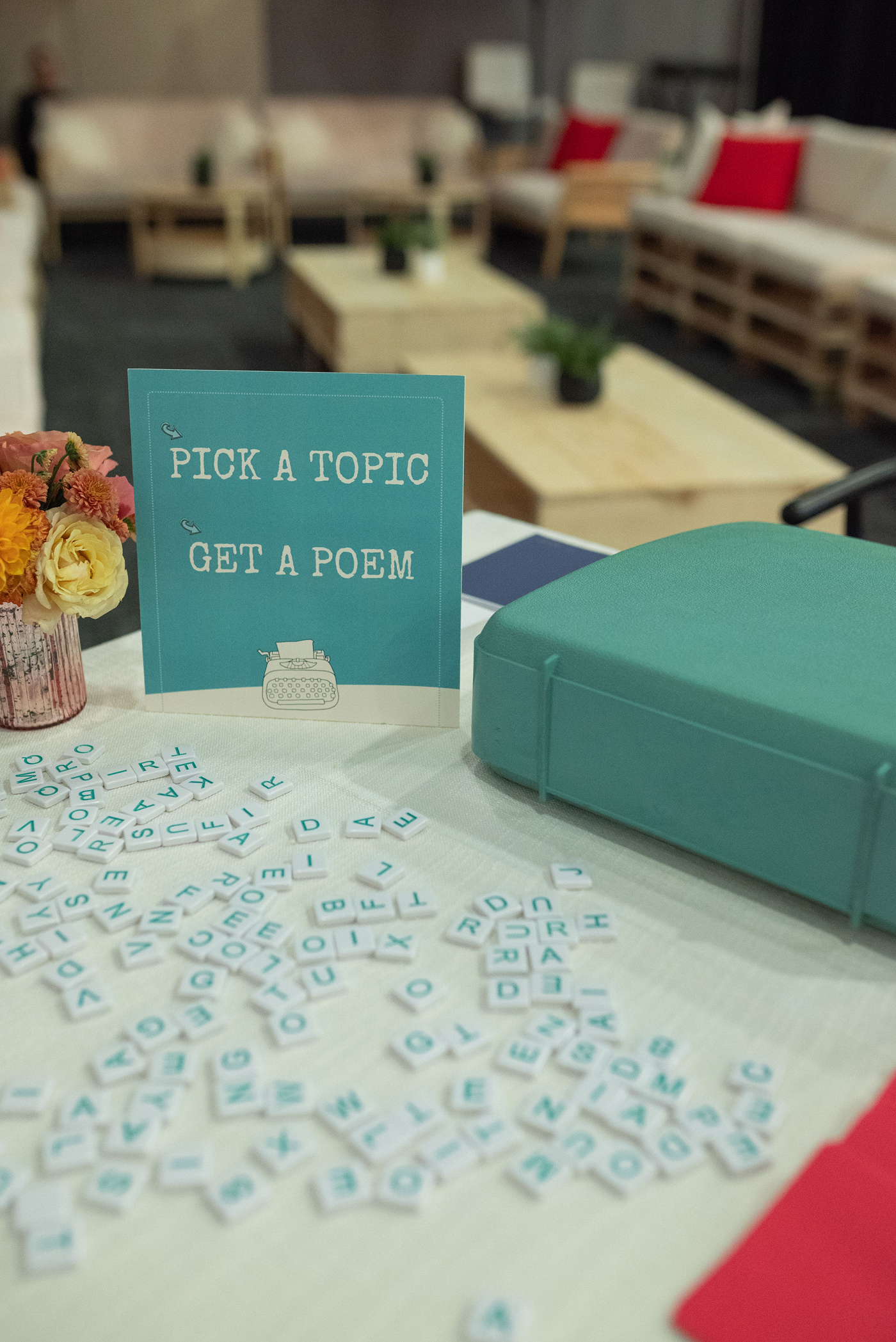 A sign invites participants to "PICK A TOPIC" and "GET A POEM"