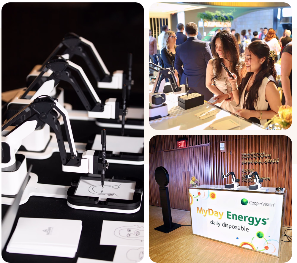 Robotic arms drawing caricatures at CooperVision promotional booth with attendees