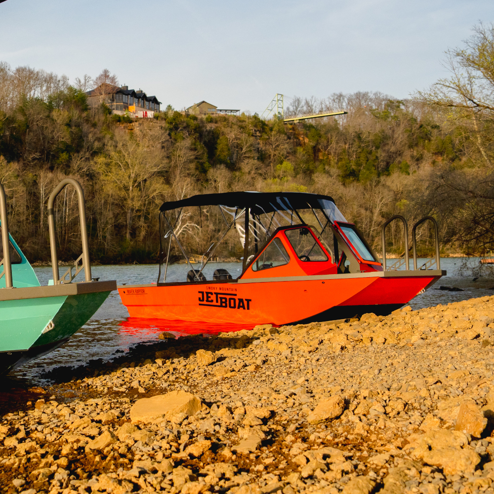 A young boy on a boat ride with Smoky Mountain Jet Boat.