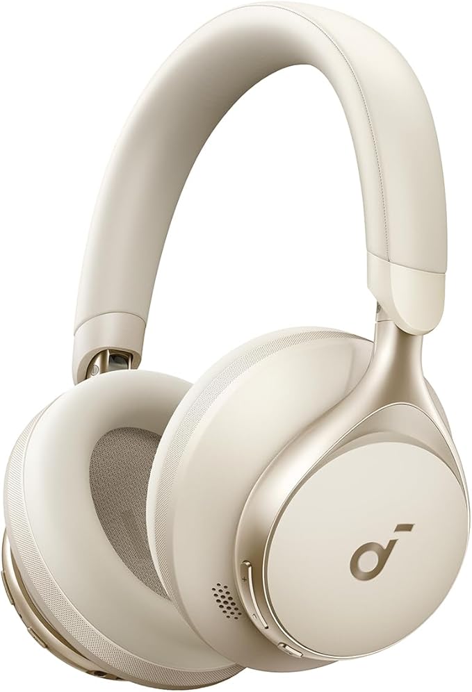 Beige over-ear wireless headphones with a sleek, modern design and cushioned ear pads, featuring the Soundcore logo on the side.