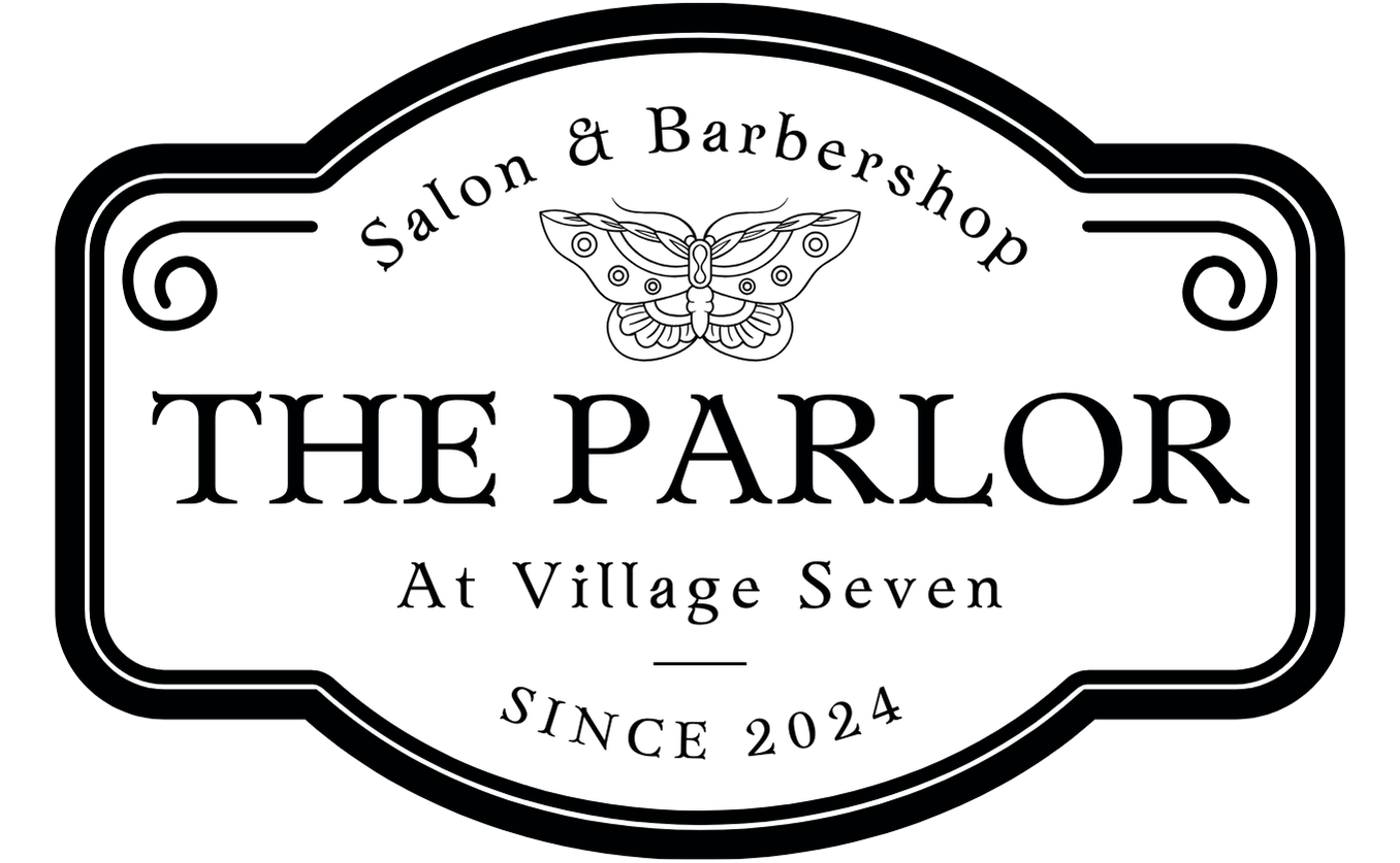 Village Seven Parlor logo