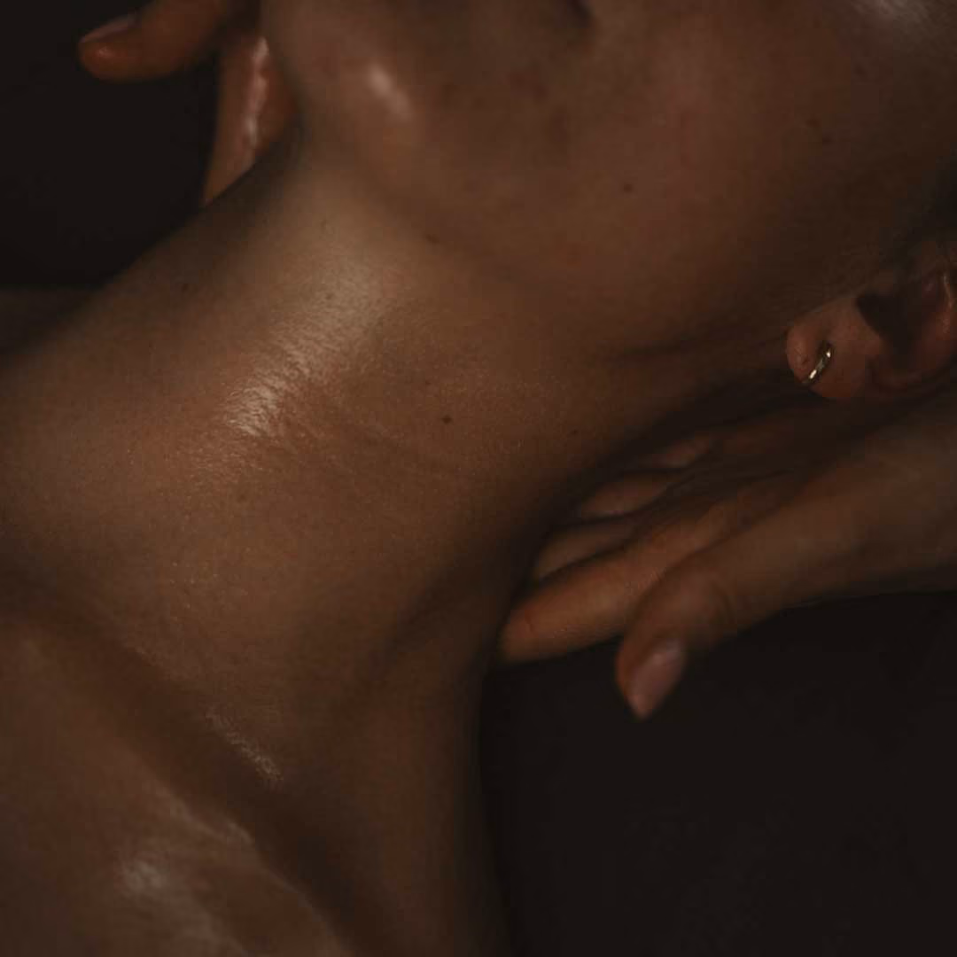 Person lying face down with one hand resting near their shoulder.
