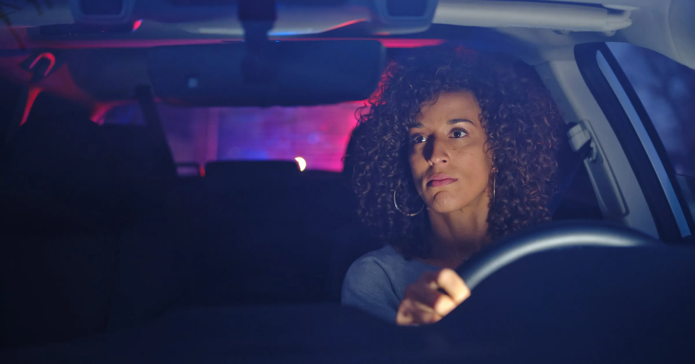 Traffic Lawyers Sydney: Woman pulled over by police while in her car in the drivers seat