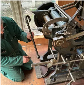 Patrick Roe building an Arab letterpress