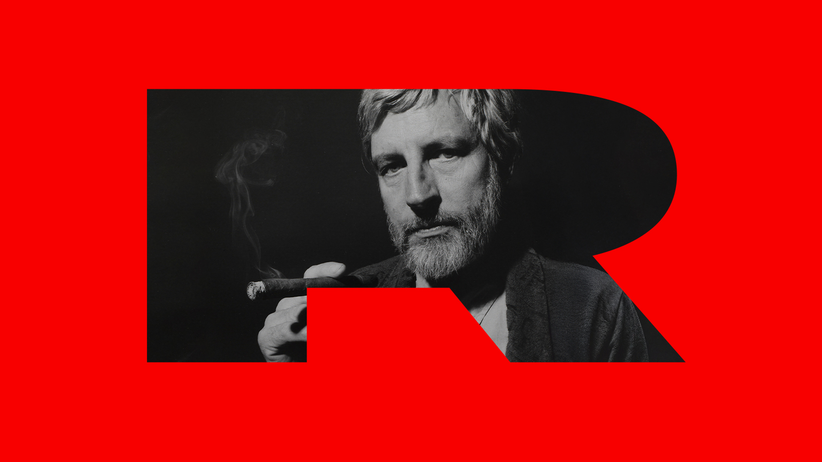 Photographie du visage de l'artiste genevois Richard Reimann avec un R rouge