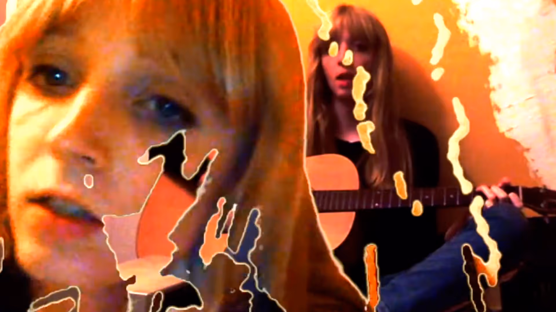 A heavily saturated, glitchy split-screen showing the same woman twice. On the left is an extreme close-up of her face: pale skin, light blue eyes, long blonde hair with bangs. On the right, she is seated against an orange wall, wearing a dark shirt and playing an acoustic guitar. Neon dripping effects overlay both shots.