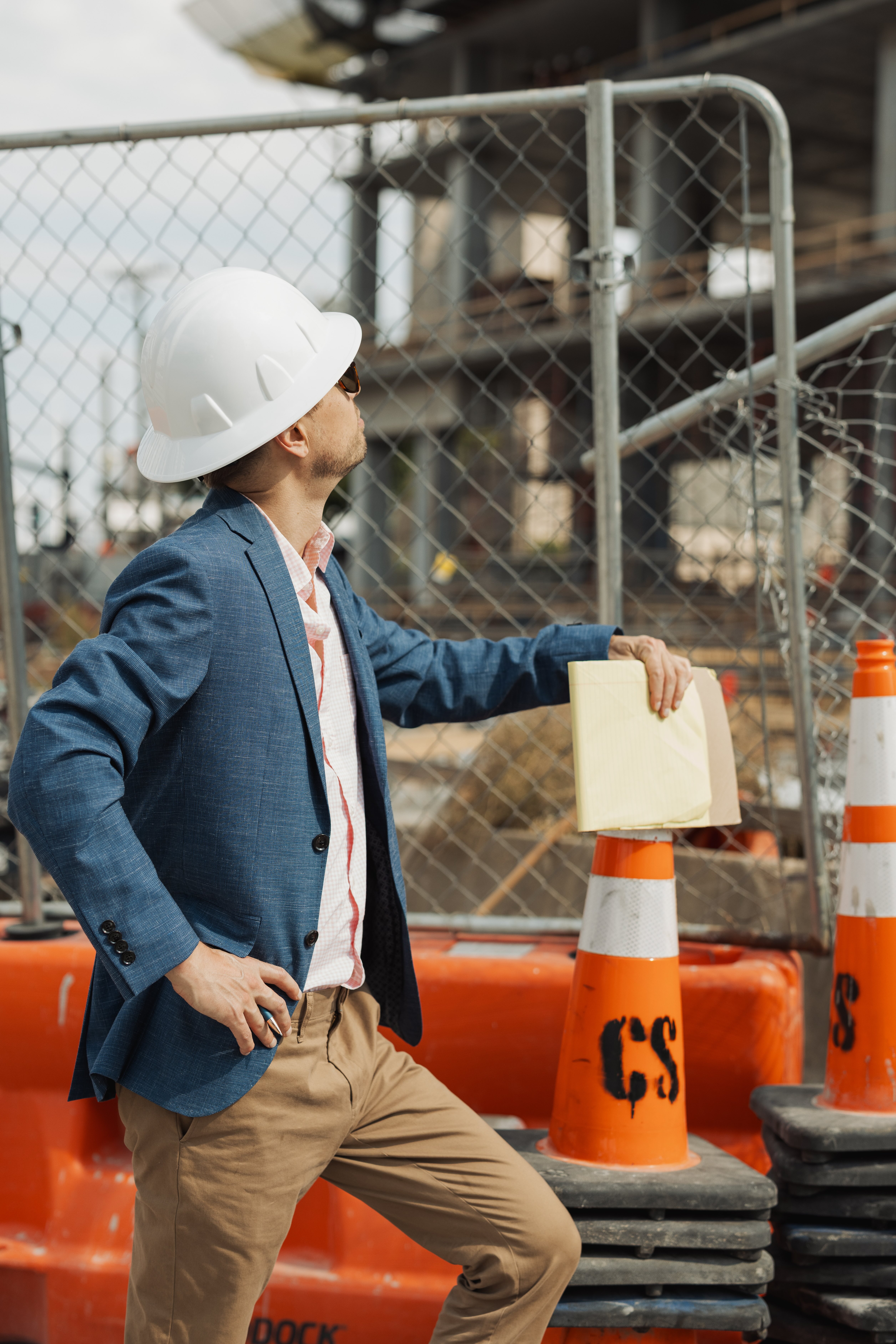 Andreas Mueller, Nashville investor-agent, on-site at a Nashville construction project wearing a hard hat